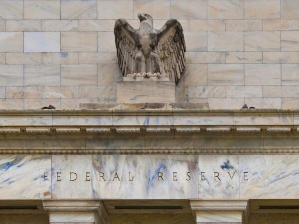 Powell speaks Monday as rate hike probability crosses 50% for the first time — the Fed’s impossible bind between stagflation, a 4.4% jobless rate, and a $112 oil price